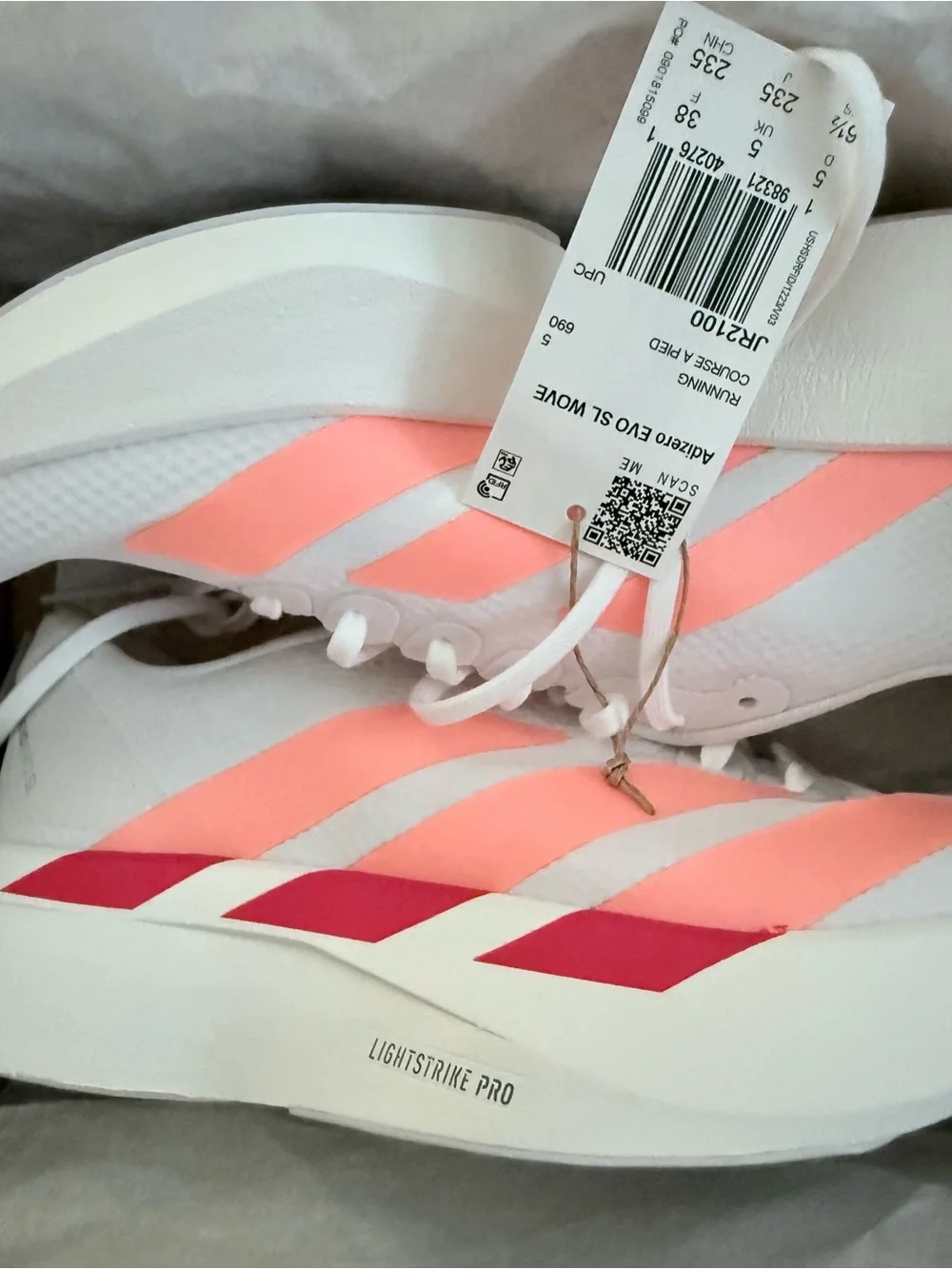 Adidas Adizero Evo SL White Running Shoes, red and orange accents. Size 6.5